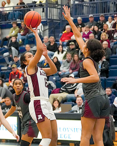 Moore helps AAHS trounce State College